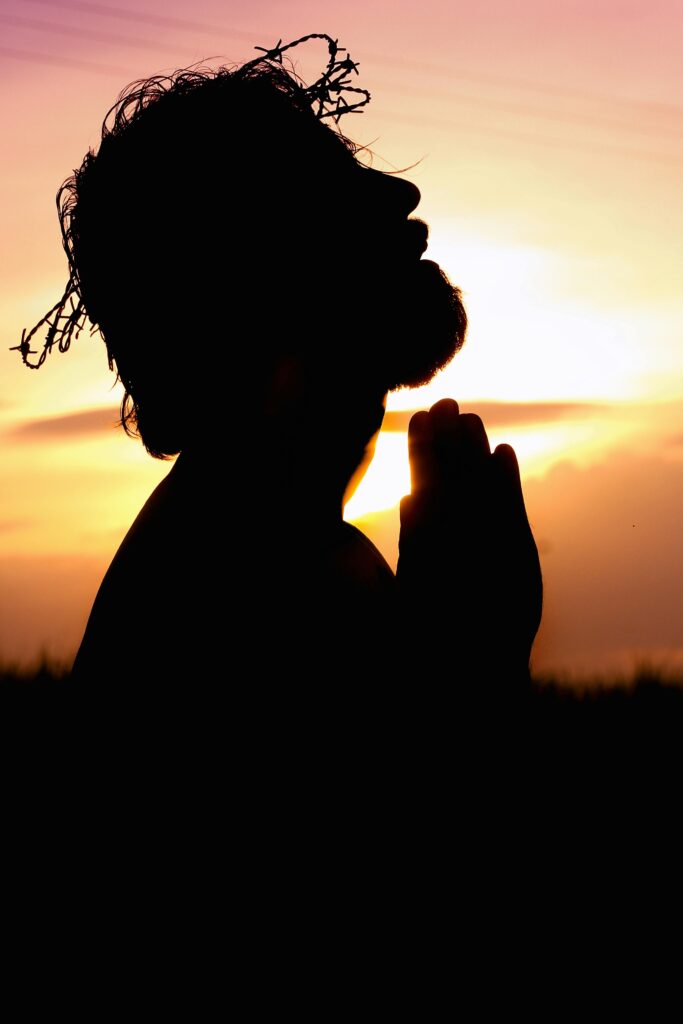 Silhouette Image of Person Praying